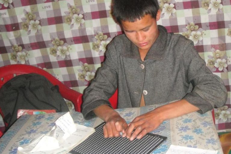 1513947130-Writing_braille_Head_Vision_Home_Simikot