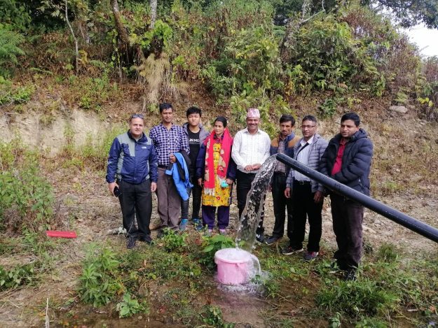 Staf en bestuur van NRCS Kaski op het hoogste punt van het project